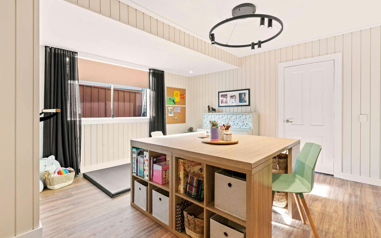 An arts and crafts zone for kids in a rumpus room