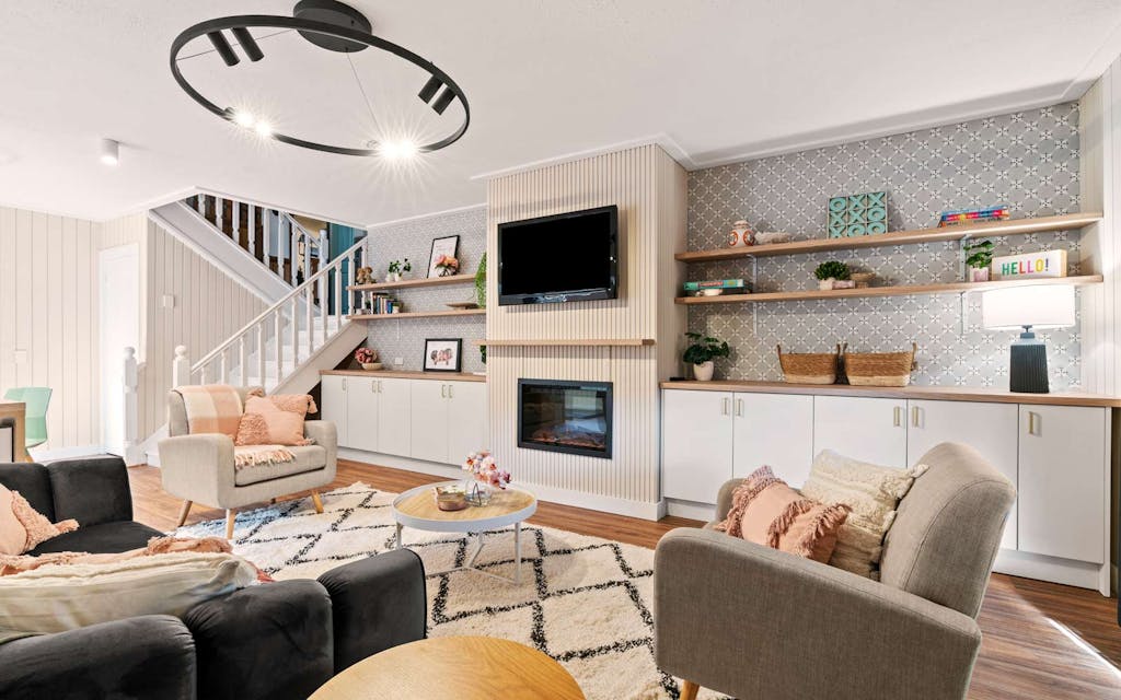 Timber panelling, wallpaper and storage on a feature wall in a rumpus room renovation
